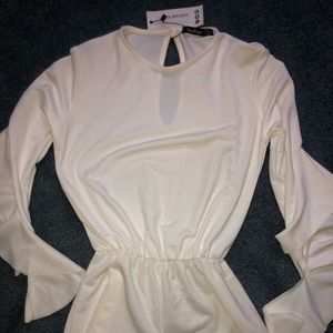 Boohoo cream long sleeve romper for sale. Never worn tags still on.
